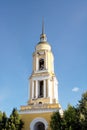 Workers painting the bell tower of the gate church at the Holy Trinity female orthodox monastery in Kolomna, Russia